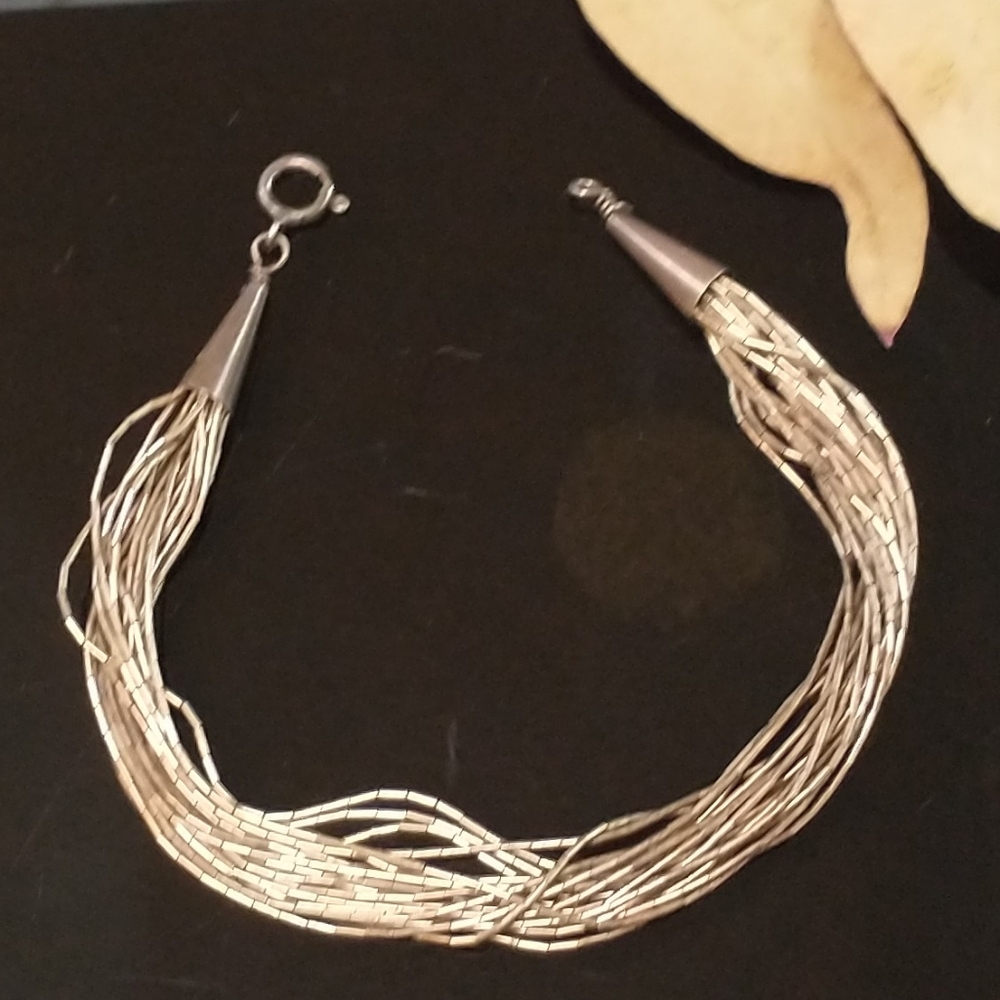 Bracelet liquid silver 20 strands
